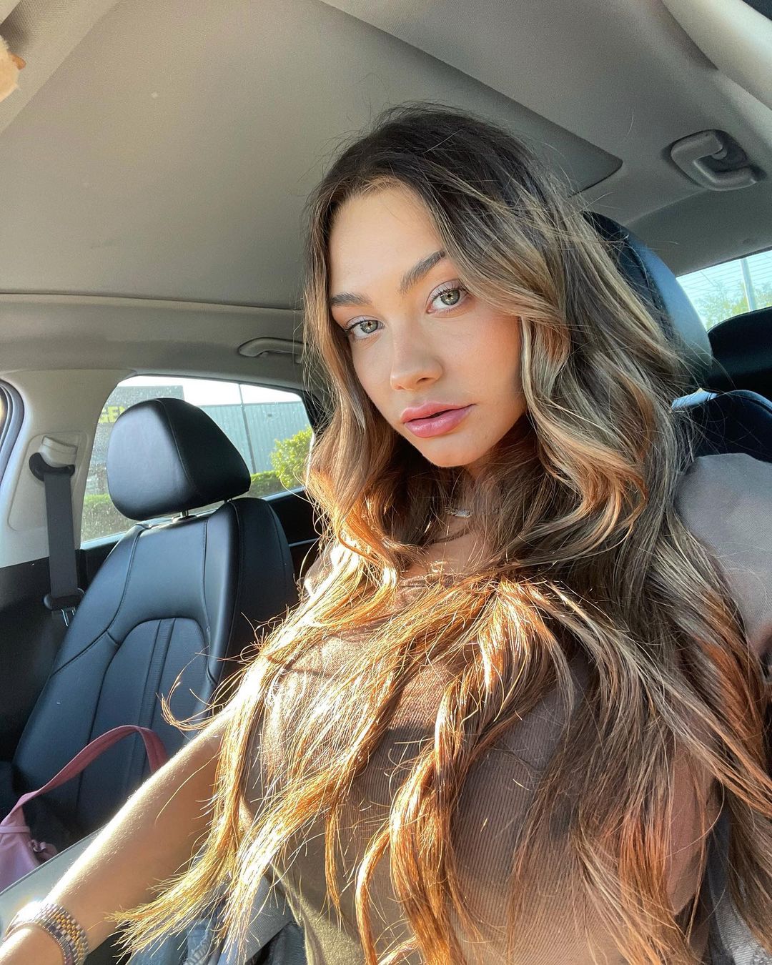 Celina Smith in a car