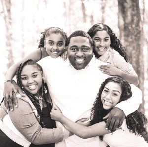 Robert Anthony Smith with his daughters