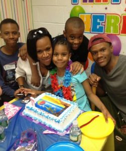Praise celebrating her birthday with family