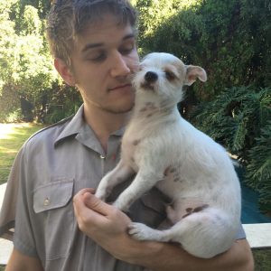 Bo Burnham with his pet dog