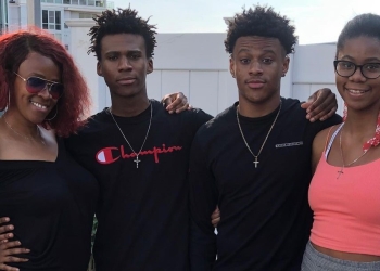 Praise Mary Ella Simmons with her family