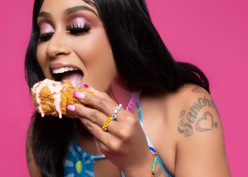 Chef Pii Eating with Pink Sauce