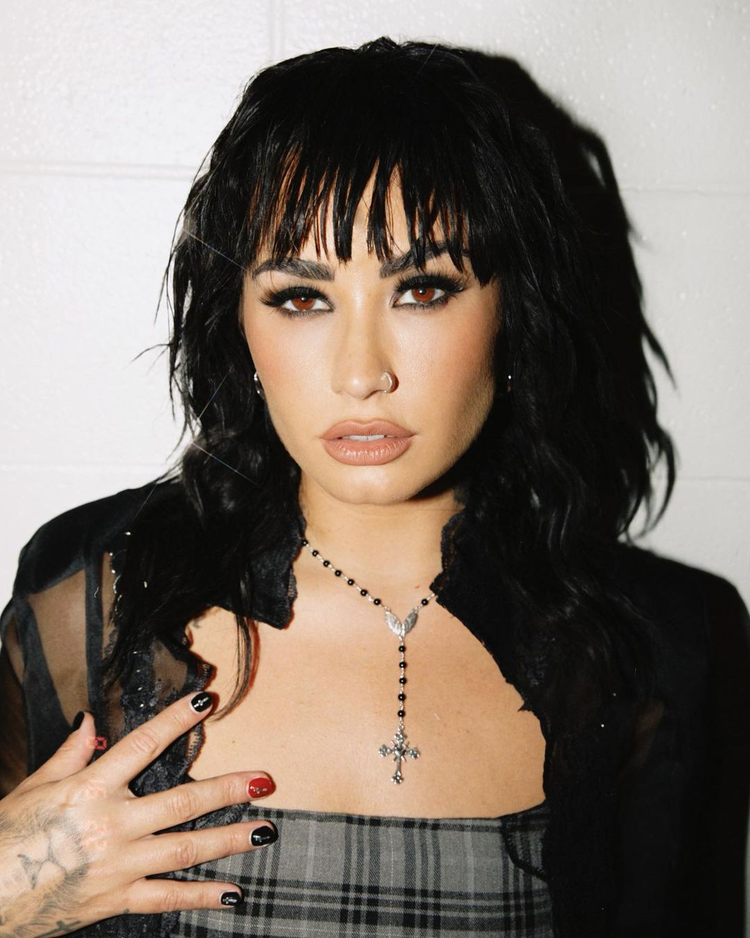 Demi Lovato wearing black jacket