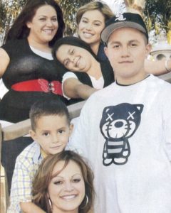 Michael Marin Rivera with his mother and siblings