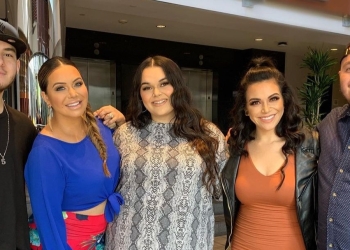 Michael Marin Rivera with his siblings