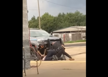 Cops beating the suspect