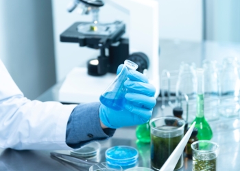 erson Holding Laboratory Flask