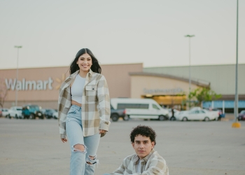 Man and Woman Smiling at Walmart Car Park