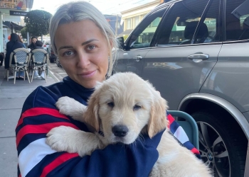 Carly Hudson with Captain