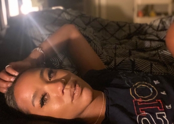 Larissa Crawford wearing a black tee