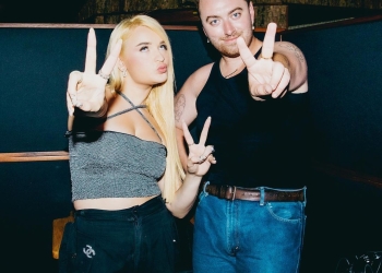 Kim Petra and Sam Smith posing together