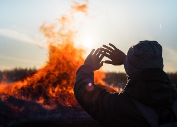 Person witnessing fire from a distance