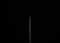 black wallpaper with a flying airplane