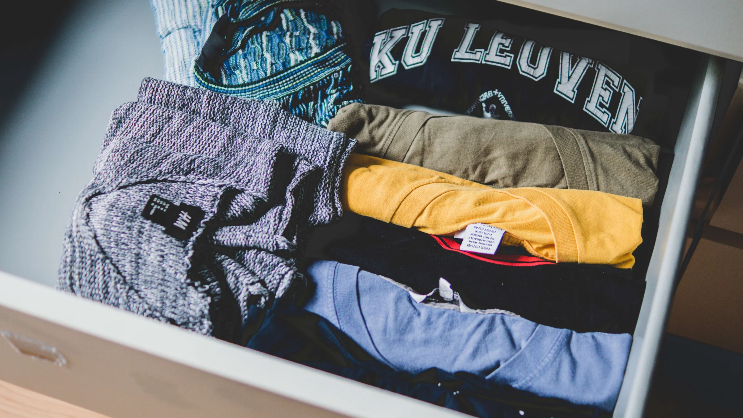 small closet with clothes
