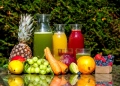 fruits and vegetables juice in a clear glass bottle